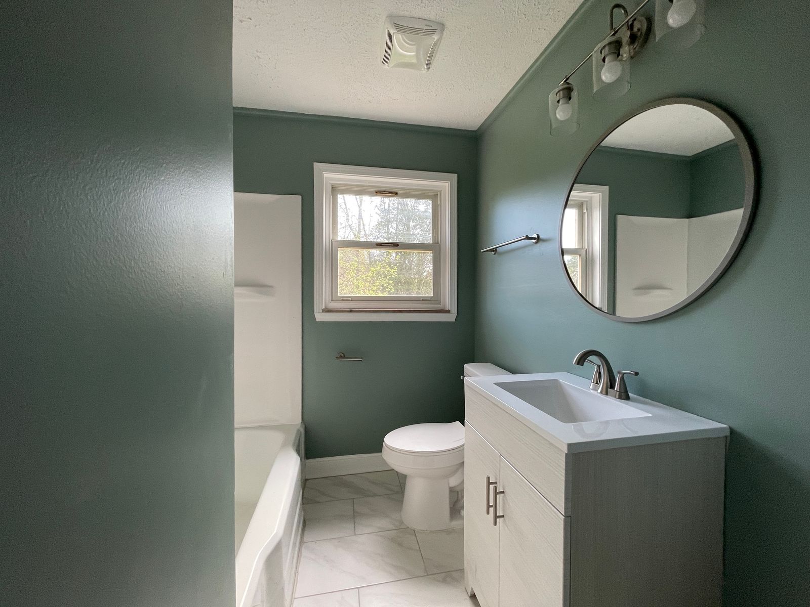 The same bathroom, fully restored